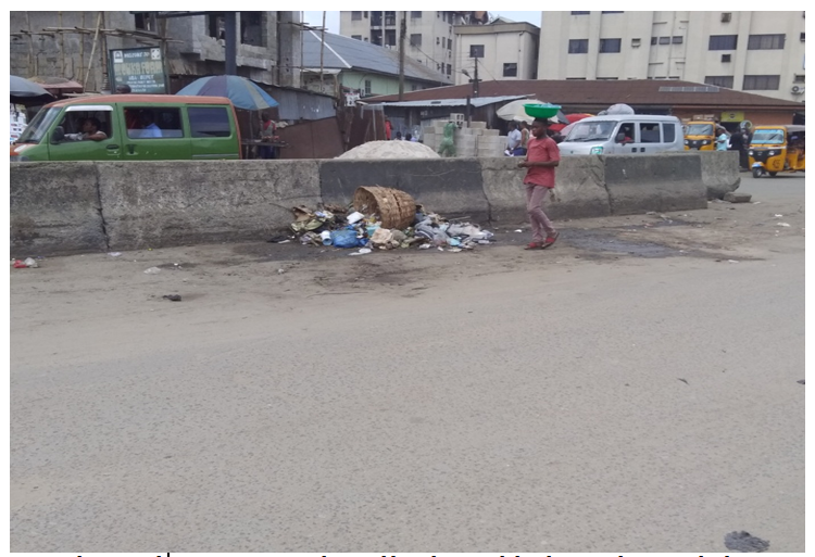 Figure 6: Indiscriminate waste disposal beside a road divide on Azikiwe road, Aba.