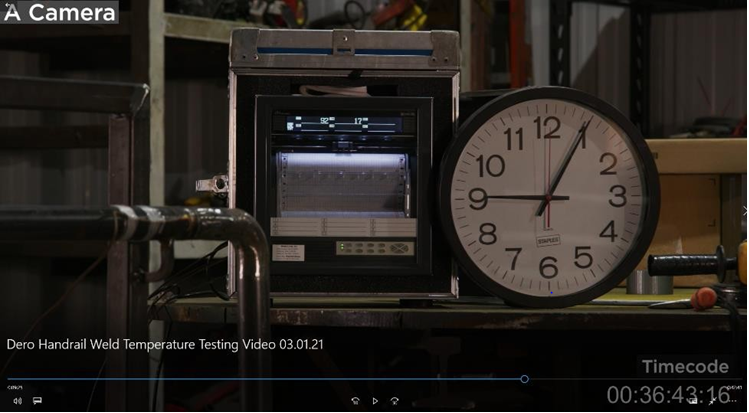 Figure 8: Handrail Weld Temperature Testing Video, Timecode 36:43:16, Temperature of 92-Degrees Fahrenheit Approximately 15 Minutes After Completion of Welding.