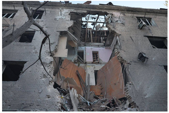 Figure 3: The stairs of a residential building destroyed by a Russian ballistic missile in the city of Zaporizhzhia, from which children and their parents are looking for a way out.
