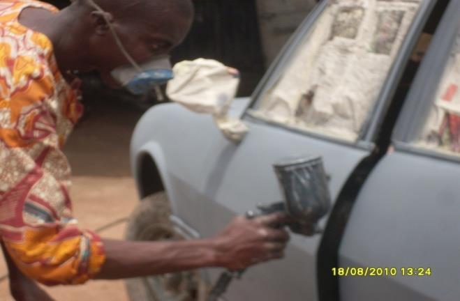 Figure 2: A spray painter using filtering/dust mask.