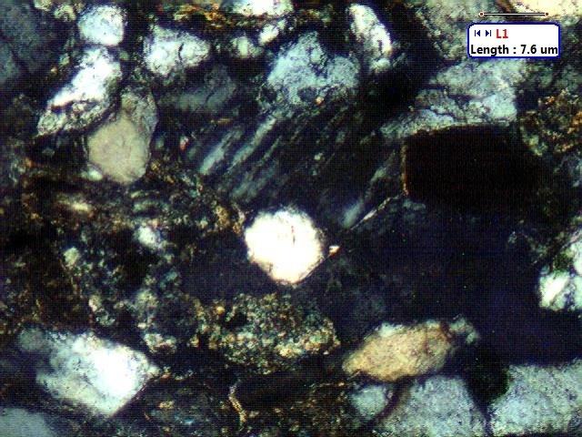 Figure 2: Thin section images of sandstone recovered from BH(A) (depth=3827-3837m) showing the presence of quartz, feldspar & rock fragments.
