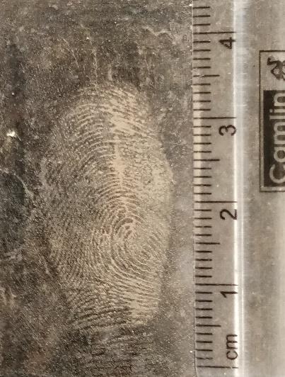 Figure 2: Development of latent fingerprints on Granite Marble surface.