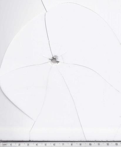 Figure 9: .303” bullet entry hole 21”. Figure 10: .303” bullet exit hole 21”.