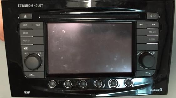 Figure 7: The Bosch unit labels provide clear identification of the model number, as well as an indication of some capabilities/ features it offers. ‘NG 2.0 HMI’ can be seen clearly along with ‘2342 7519’. This identifies the particular model. Small text printed indicates this relates to ‘car multimedia’ and a quick open source search of the unit details confirms the item to be a control unit for navigation and infotainment. Opening up the Bosch unit (via removal of 4 screws and some clasps) allows the PCB to be examined. A variety of ports appear on the PCB, including 3 miniUSB ports. Connection points on the PCB itself could be seen, which could indicate JTAG points, or similar manufacturer testing connectivity. Multiple unrecognised ports also reside at various locations on the PCB Figure 8. Figure 6: Zafira 2012 Infotainment Unit (front view). Figure 7: Insignia 2014 Bosch HMI unit.
