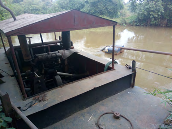Figure 5: Showing sand mining at the two sampling points of maximum sand mining at Urashi River using a dredging machine and manual hand digging by miners. Source: Fieldwork, 2020.