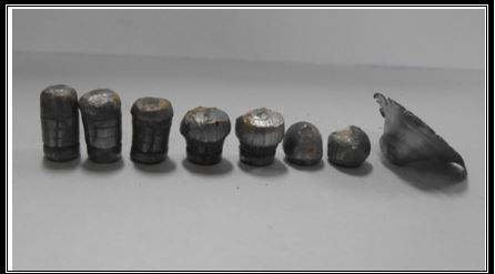 Figure 5: The progression of mushrooming of nose of these bullets can be seen in this figure, followed by pellet shaped core obtained in sheets of gauge 20 and 18. At extreme right, is given the bullet which could not pass through the sheet of gauge 16 and found stuck in the dent. It can be seen that outer stripped portion could not separate from the core and results in disc shaped remnant of lead.