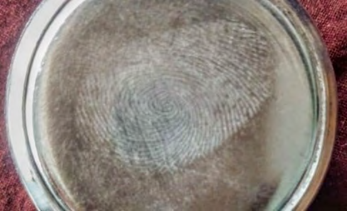 Figure 2: Development of Latent Fingerprint with the help of table salt powder on porous lock surface.