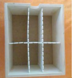 Figure 3: The images show a wooden box used in the experimental phase with the six separators inside that facilitated the insertion of the smartphone inside.