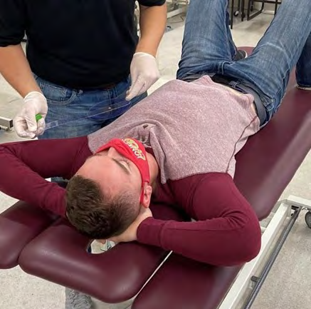 Figure 1: Measuring shoulder abduction with a goniometer.