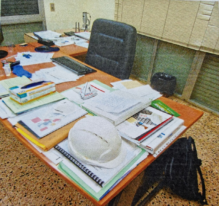 Figure 1: Factory Director’s table and the personal suicide note addressed to his wife and family.